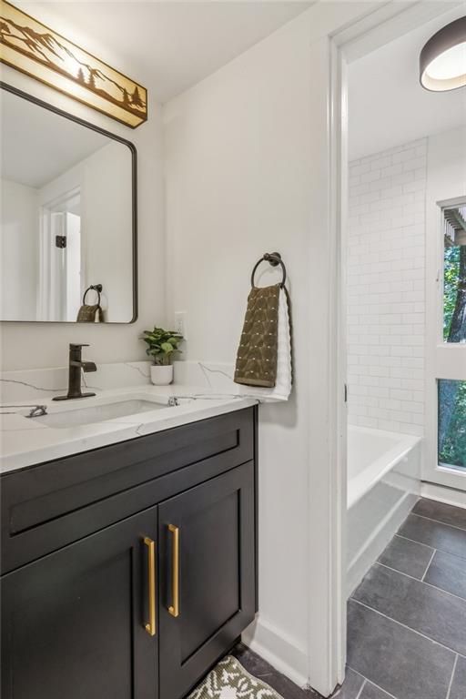 626 Petit Ridge Drive Big Canoe, GA 30143 - Photo 33 of 42 a bathroom with a sink and a mirror
