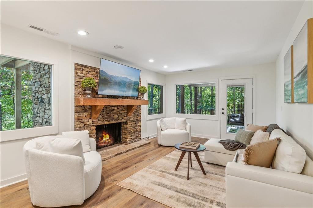626 Petit Ridge Drive Big Canoe, GA 30143 - Photo 35 of 42 a living room with furniture and a fireplace