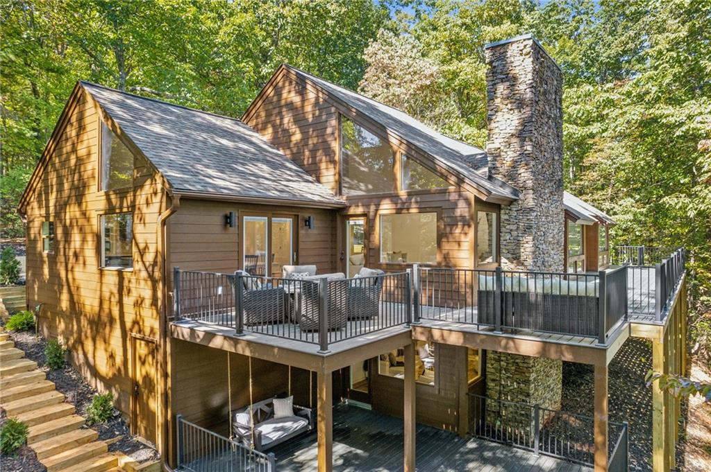 626 Petit Ridge Drive Big Canoe, GA 30143 - Photo 39 of 42 a view of house with outdoor seating space