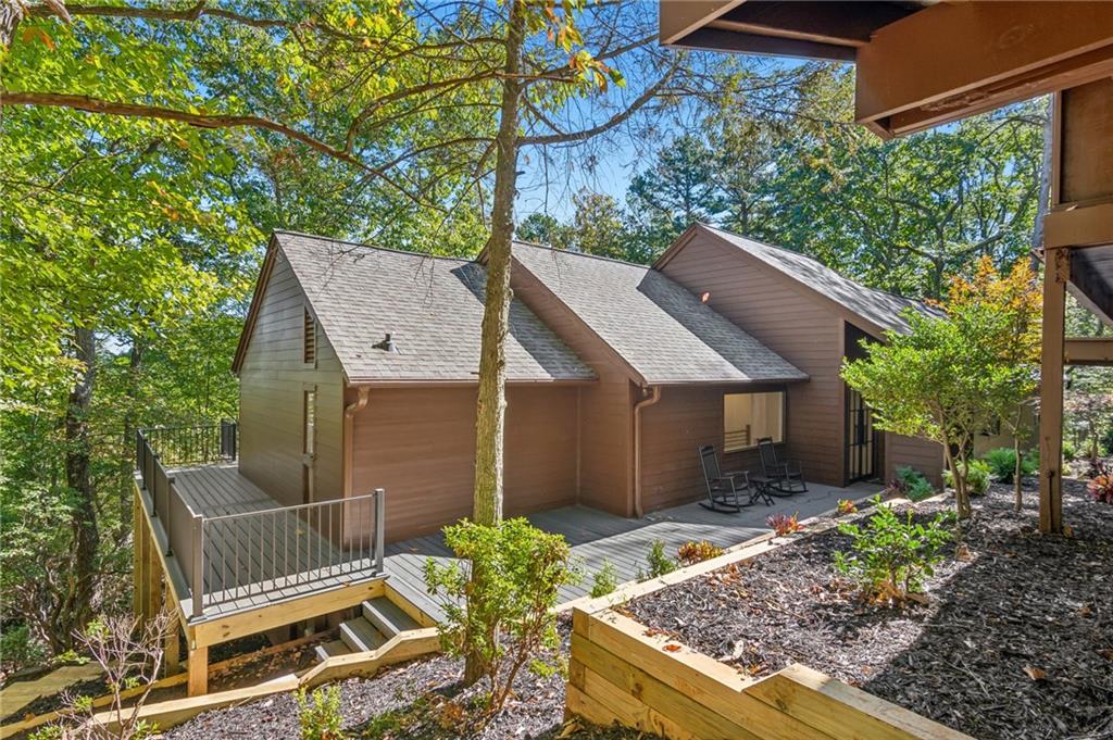 626 Petit Ridge Drive Big Canoe, GA 30143 - Photo 4 of 42 a view of a house with a yard