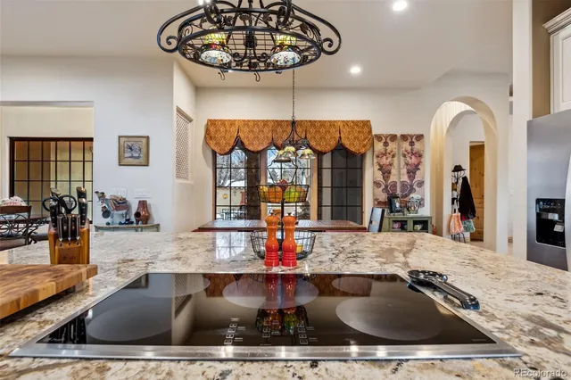 a very nice looking kitchen with a large island