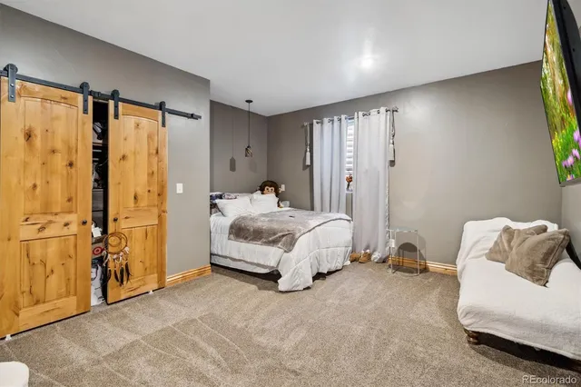 a view of a chairs and table in the balcony