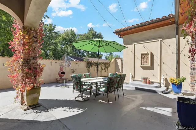 a view of a swimming pool with a patio