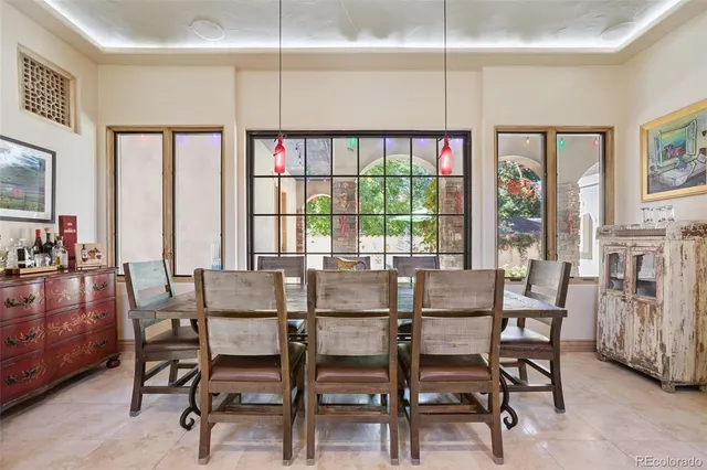 a view of a dining room with furniture window and outside view