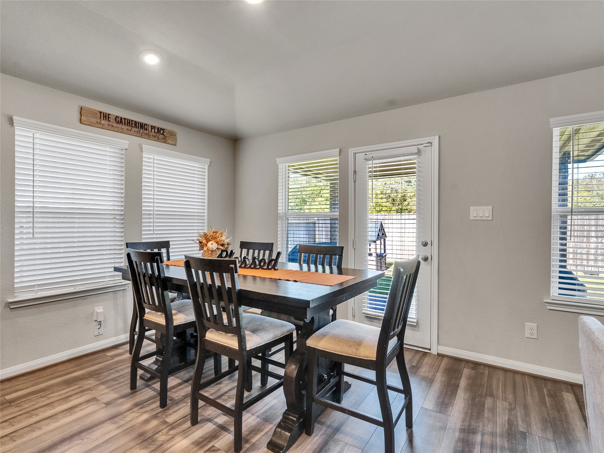 6006 Scott Way Rosenberg, TX 77471 - Photo 13 of 42 a dining room with furniture and wooden floor