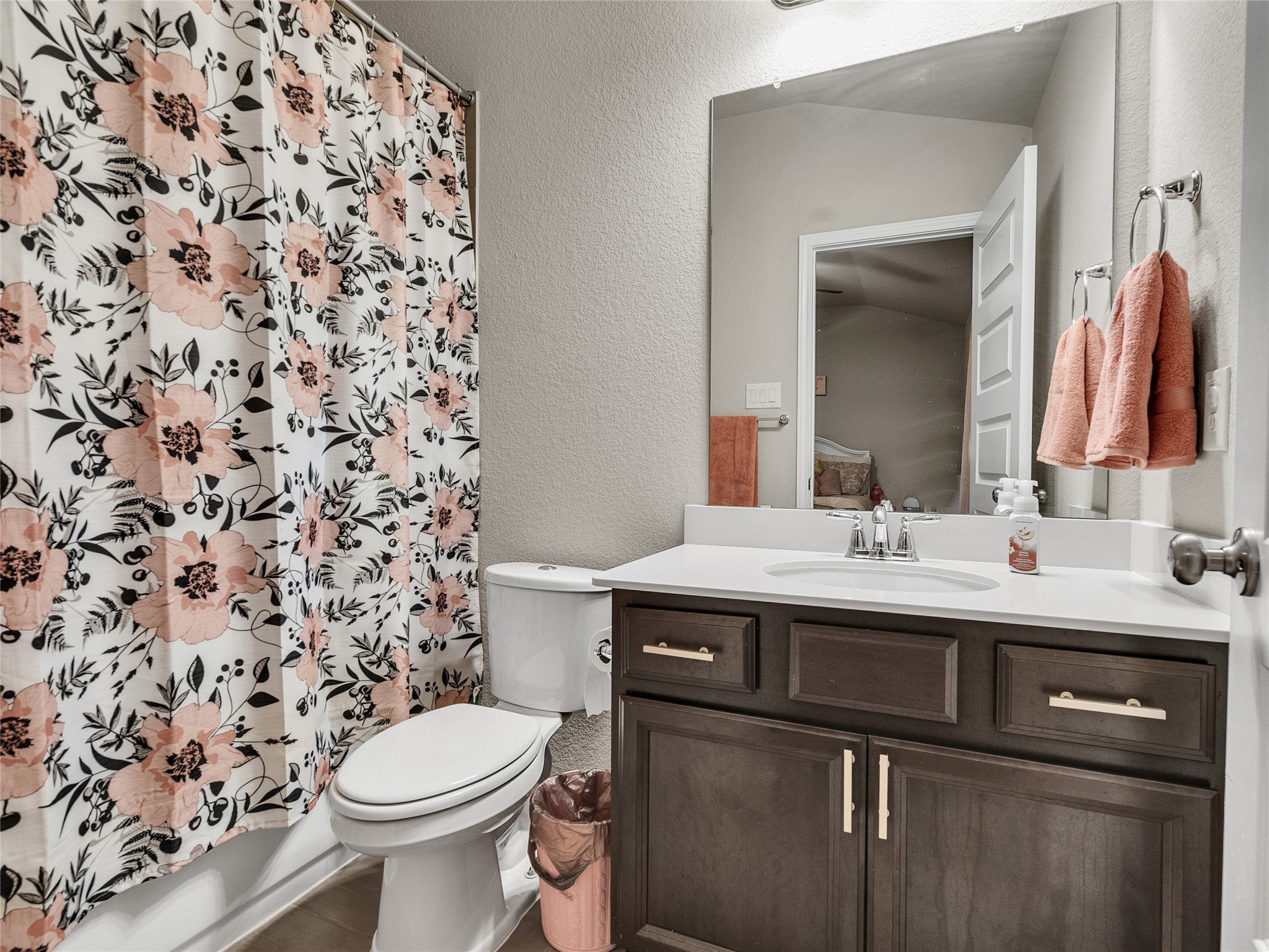 6006 Scott Way Rosenberg, TX 77471 - Photo 21 of 42 a bathroom with a sink toilet and mirror