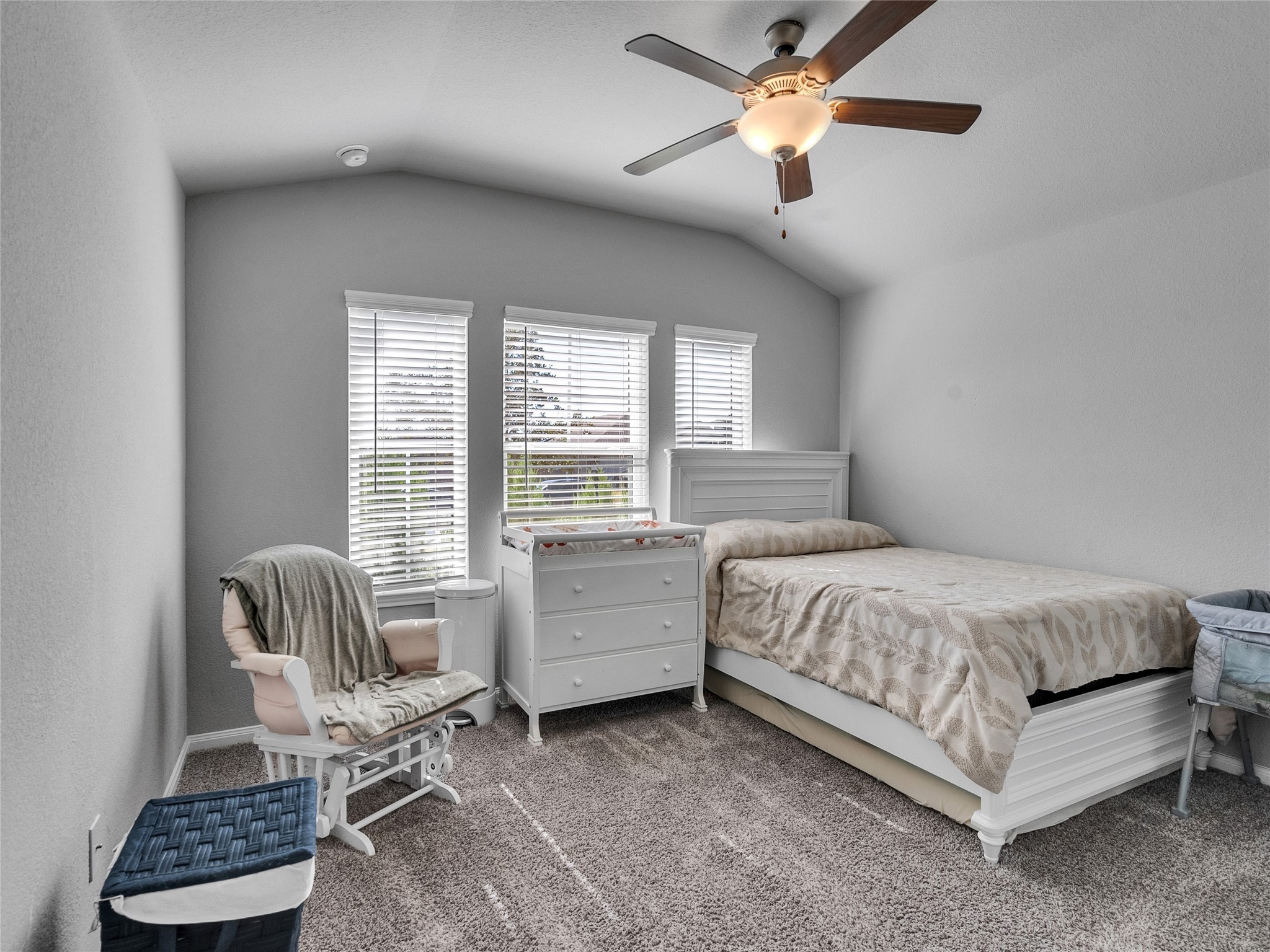 6006 Scott Way Rosenberg, TX 77471 - Photo 23 of 42 a bedroom with a bed and a chandelier