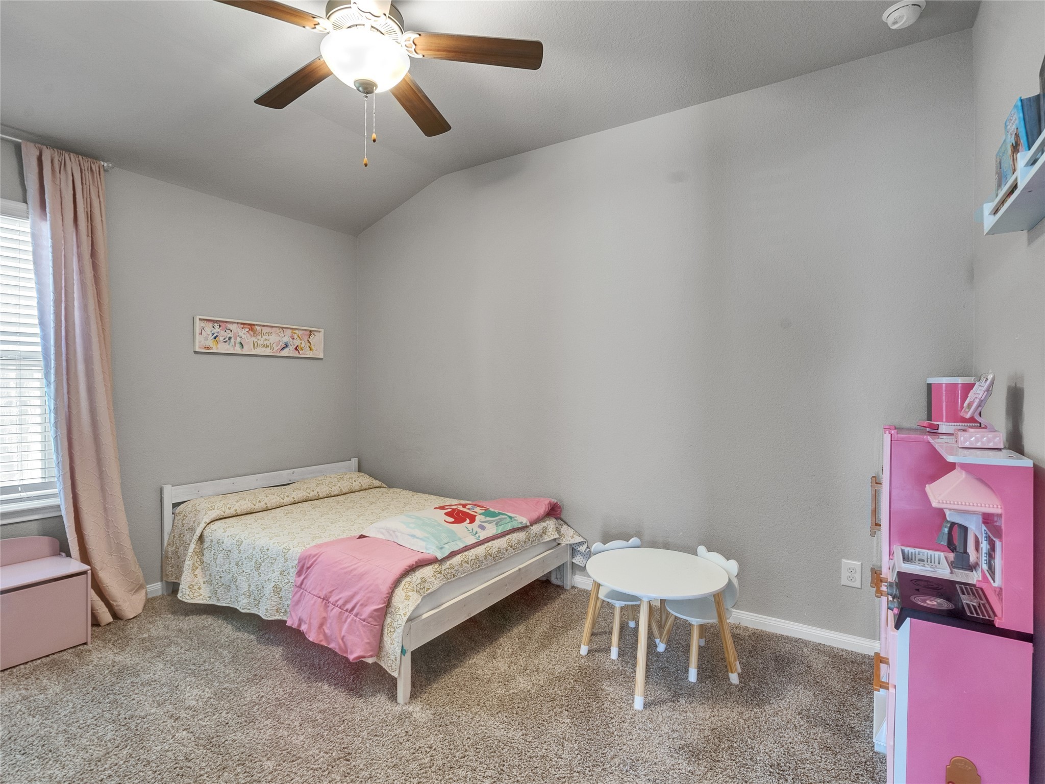 6006 Scott Way Rosenberg, TX 77471 - Photo 24 of 42 a bedroom with a bed and a chandelier