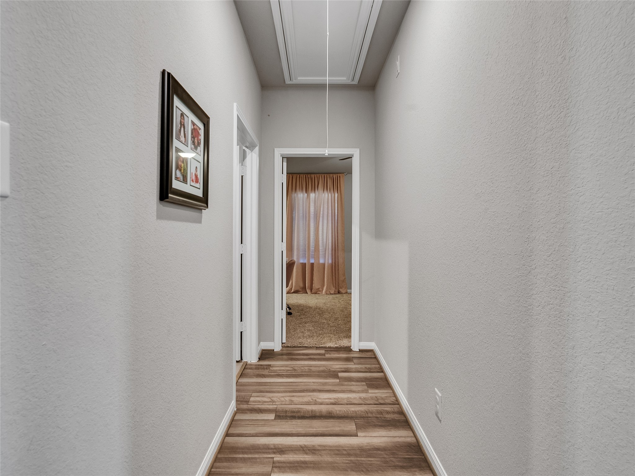 6006 Scott Way Rosenberg, TX 77471 - Photo 28 of 42 a view of a hallway with wooden floor and entryway