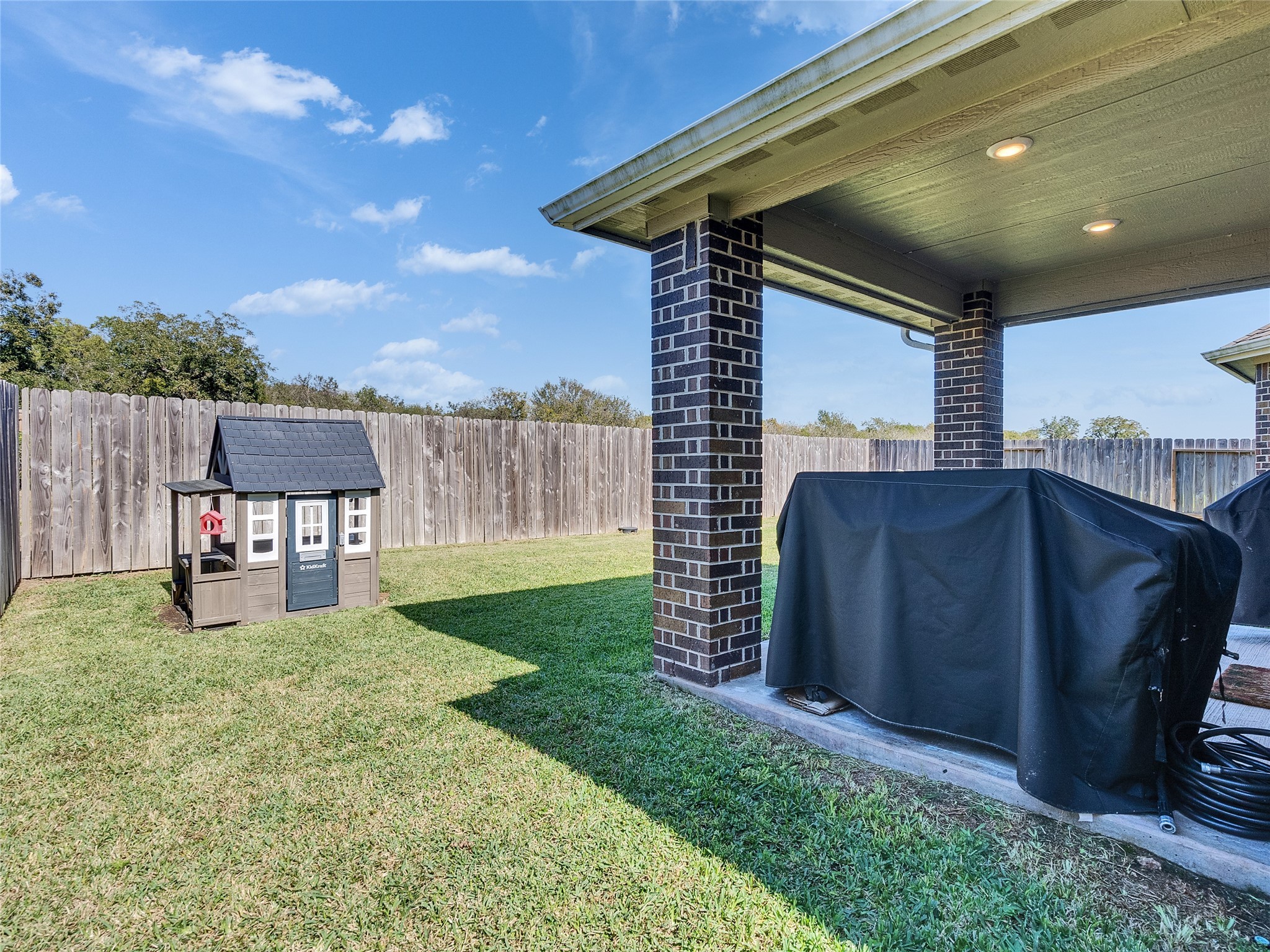 6006 Scott Way Rosenberg, TX 77471 - Photo 29 of 42 a view of a house with backyard and porch