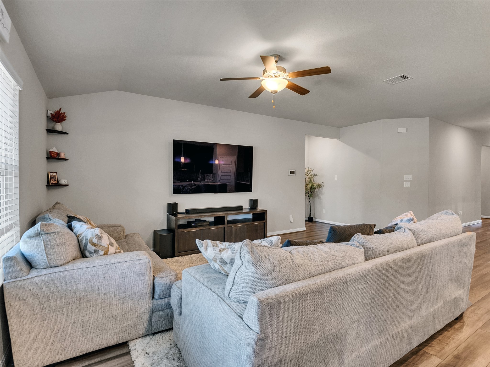 6006 Scott Way Rosenberg, TX 77471 - Photo 7 of 42 a living room with furniture and a flat screen tv