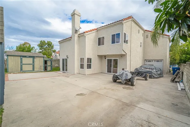 a house view with a garden space