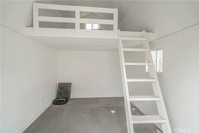 a view of a lake with a building in the background