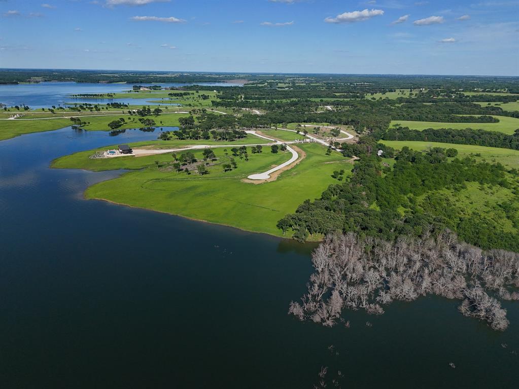 437 Harborside Terrace Windom, TX 75492 - Photo 11 of 28 a view of a lake with a big yard