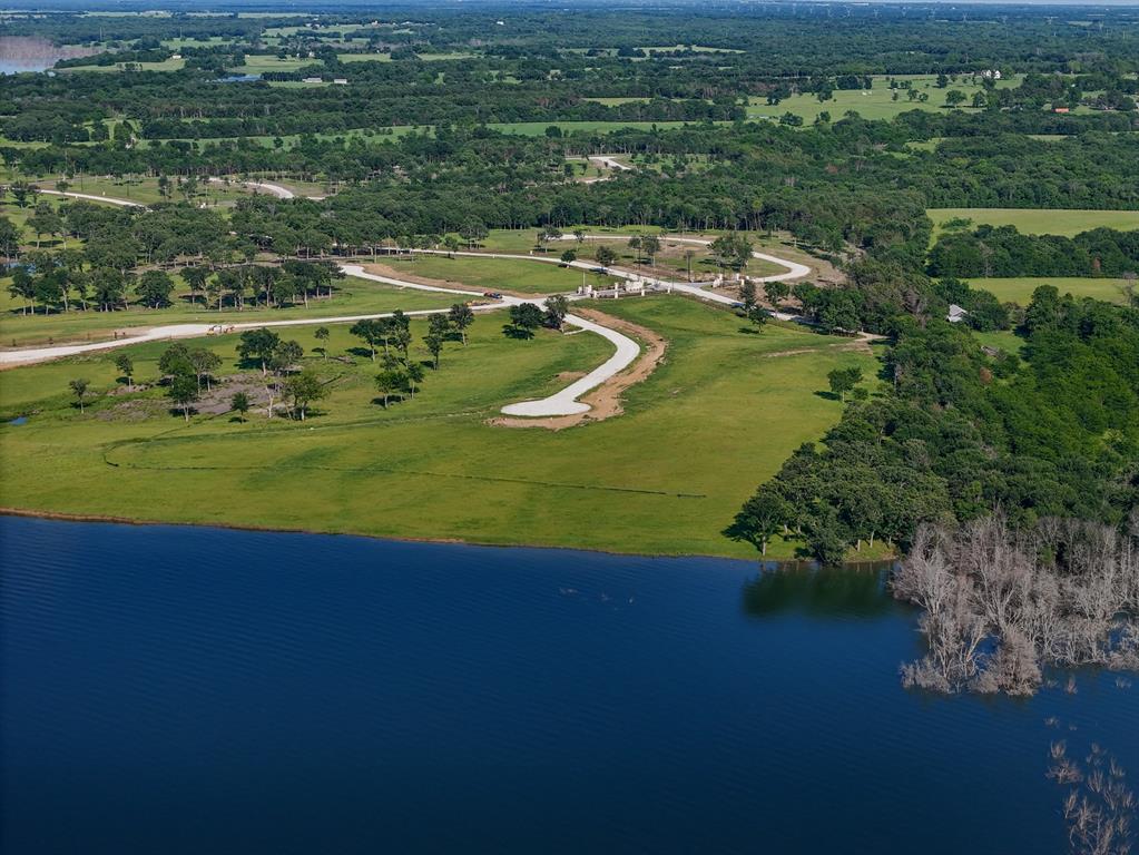 437 Harborside Terrace Windom, TX 75492 - Photo 12 of 28 an aerial view of a house with a yard