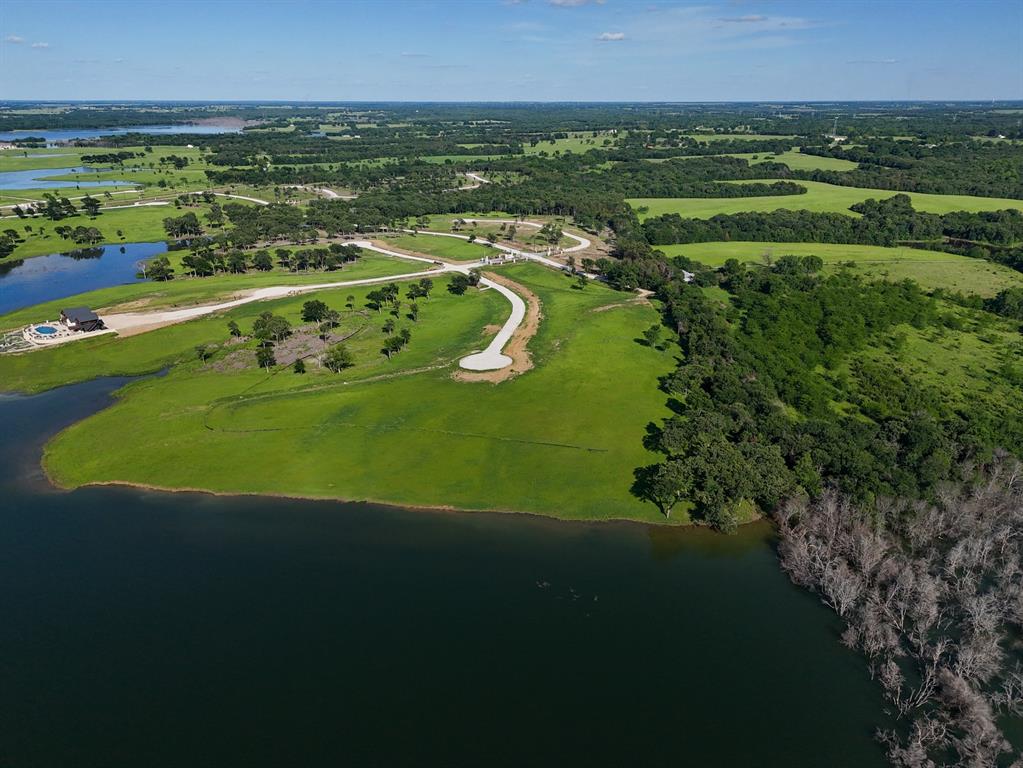 437 Harborside Terrace Windom, TX 75492 - Photo 14 of 28 a view of a lake with a yard