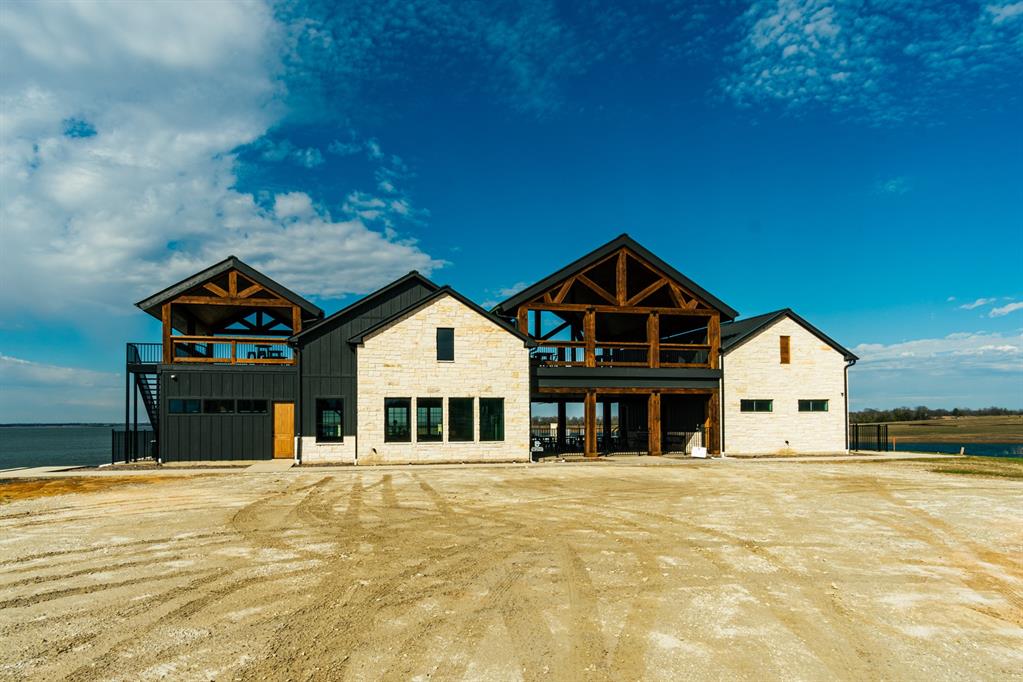 437 Harborside Terrace Windom, TX 75492 - Photo 17 of 28 a front view of a house with a garage