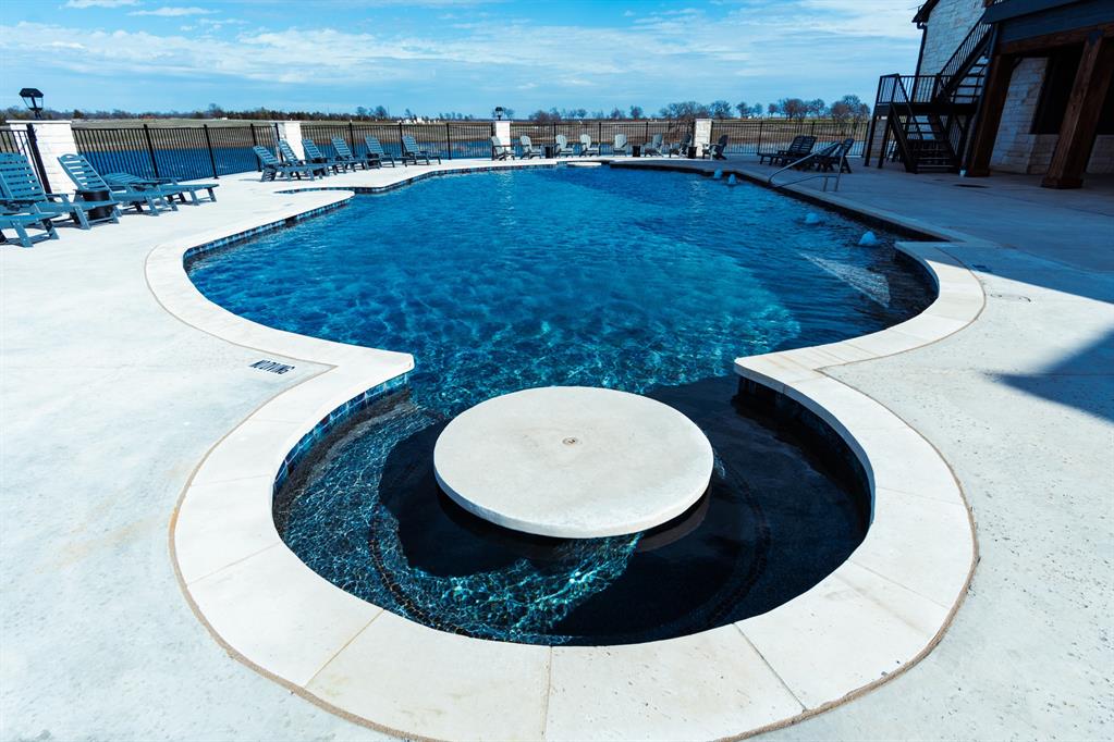 437 Harborside Terrace Windom, TX 75492 - Photo 19 of 28 a view of a swimming pool with outdoor seating