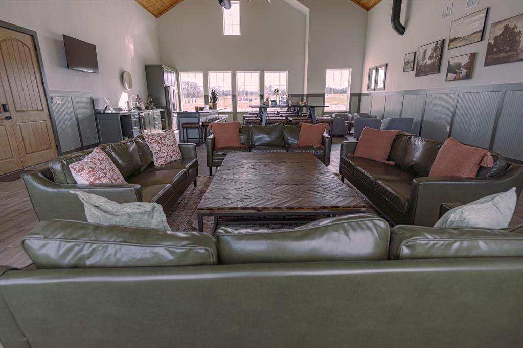437 Harborside Terrace Windom, TX 75492 - Photo 21 of 28 a living room with furniture and a large window