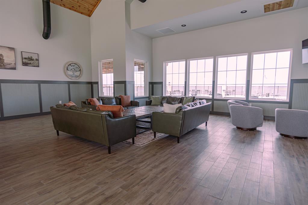 437 Harborside Terrace Windom, TX 75492 - Photo 22 of 28 a living room with furniture and a large window