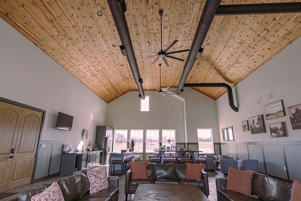 437 Harborside Terrace Windom, TX 75492 - Photo 23 of 28 a living room with lots of furniture and a chandelier