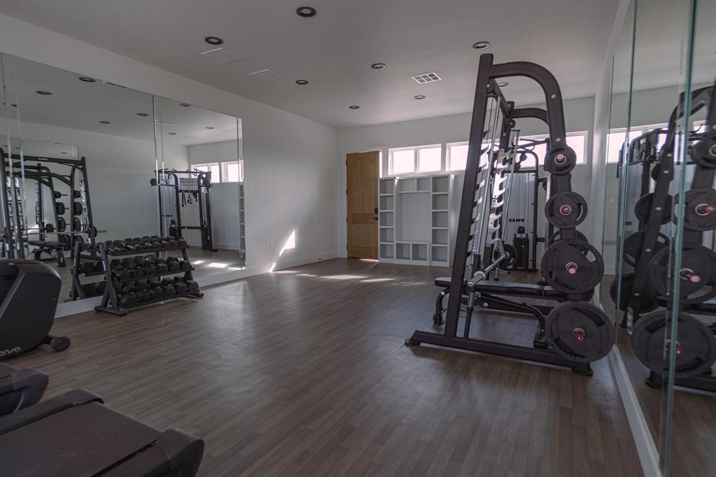 437 Harborside Terrace Windom, TX 75492 - Photo 24 of 28 a view of a room with gym equipment