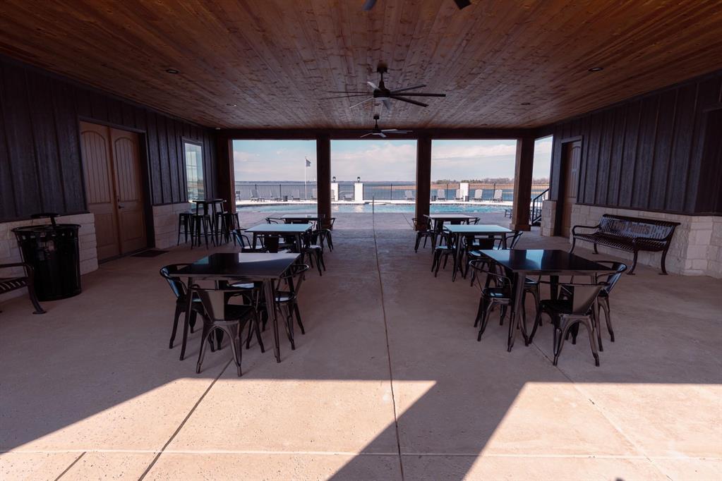 437 Harborside Terrace Windom, TX 75492 - Photo 25 of 28 a view of a dining hall with furniture