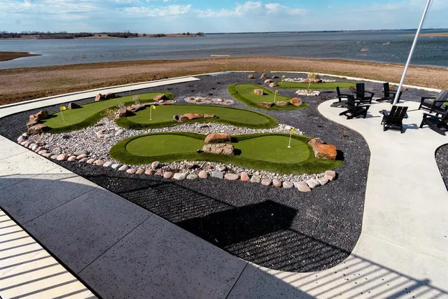 an aerial view of a house with garden space sitting space
