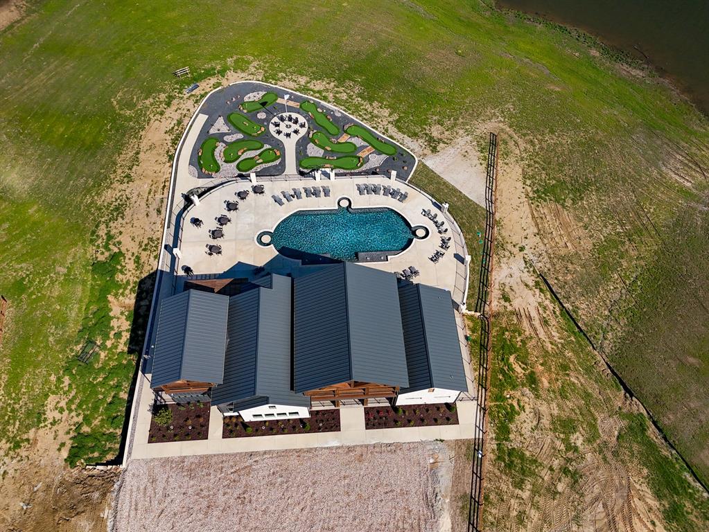 437 Harborside Terrace Windom, TX 75492 - Photo 27 of 28 an aerial view of a house with garden space sitting space