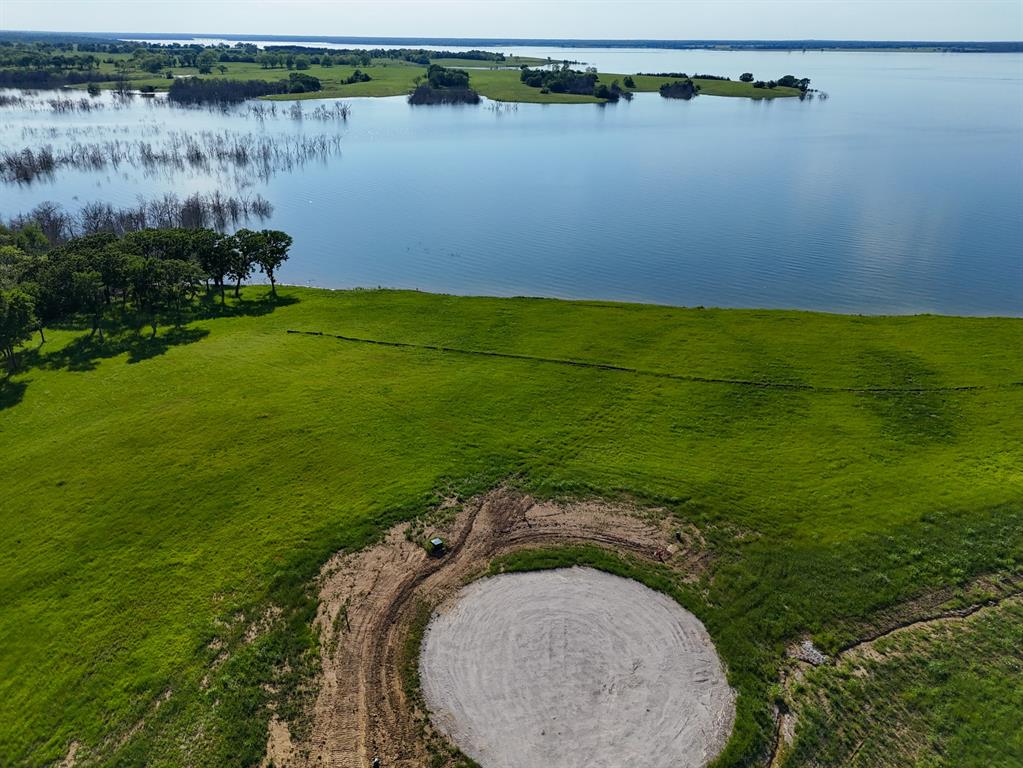 437 Harborside Terrace Windom, TX 75492 - Photo 3 of 28 an aerial view of a house with a lake view