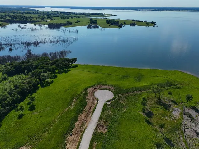 a view of a lake with a outdoor space