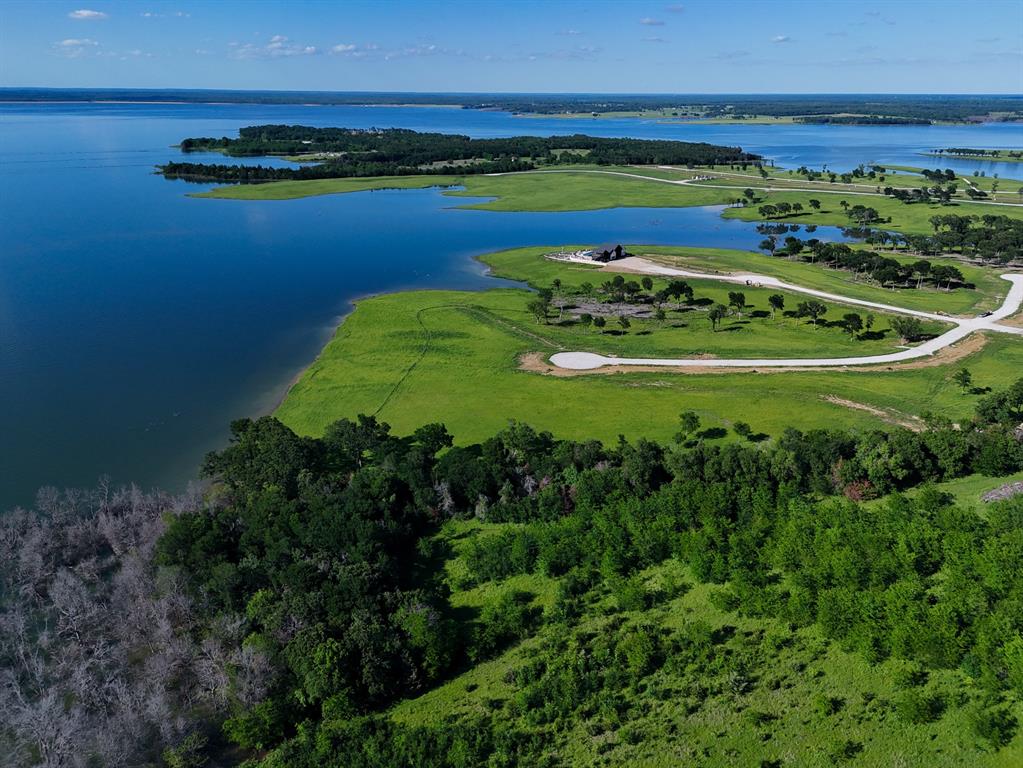 437 Harborside Terrace Windom, TX 75492 - Photo 7 of 28 a view of a lake with a big yard