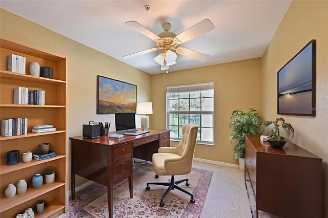 a workspace with furniture window and wooden floor