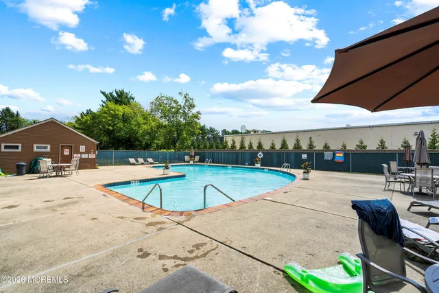 a view of a house with a yard balcony