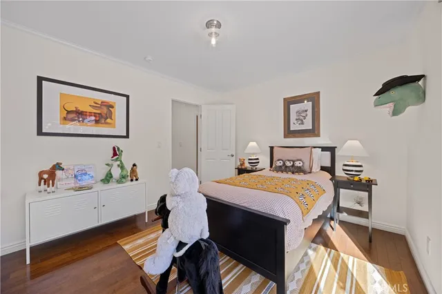 a room with a bed and a table in it