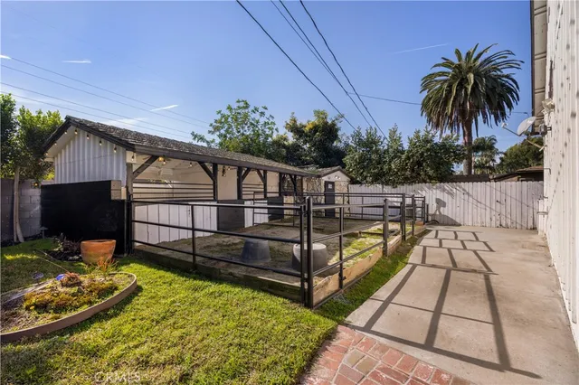 a view of swimming pool with a patio