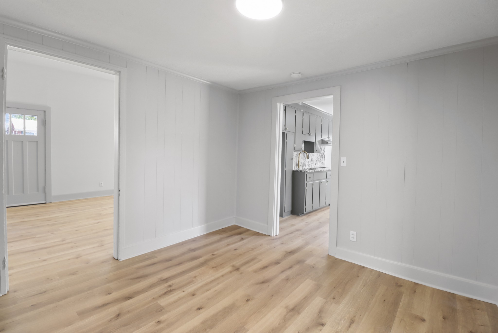 213 North Walnut Street Springfield, TN 37172 - Photo 8 of 20 a view of wooden floor in an empty room