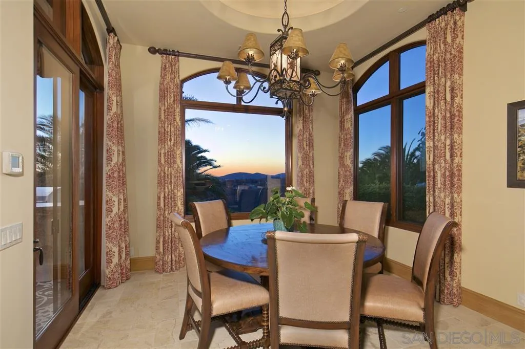 17087 Old Coach Road Poway, CA 92064 - Photo 12 of 25 a view of a dining room with furniture window and outside view
