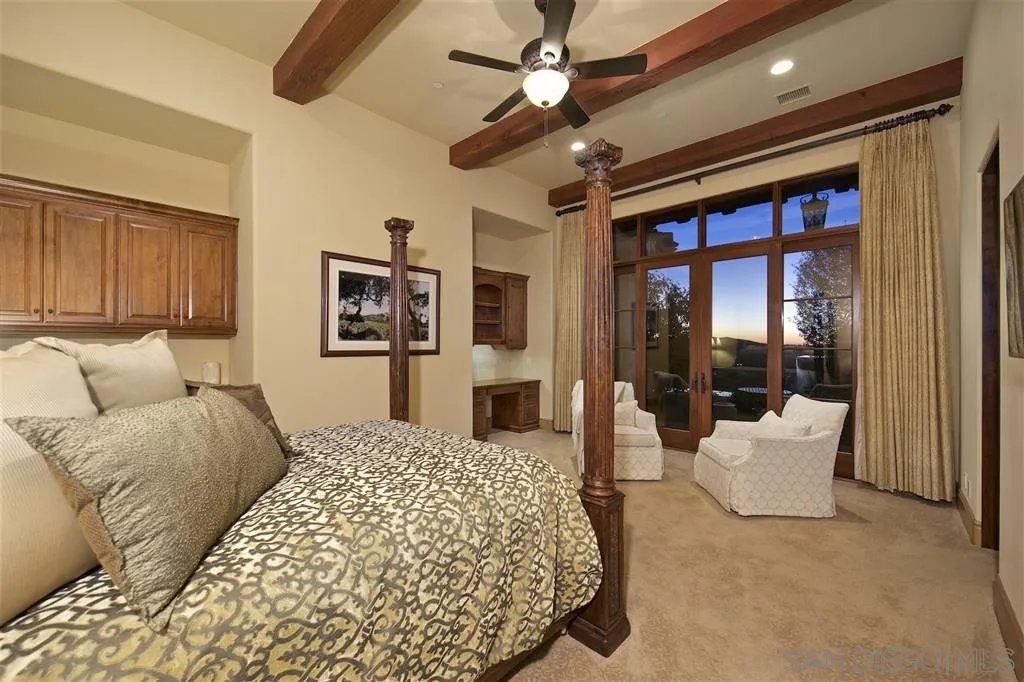17087 Old Coach Road Poway, CA 92064 - Photo 24 of 25 a bedroom with a large bed and a large window