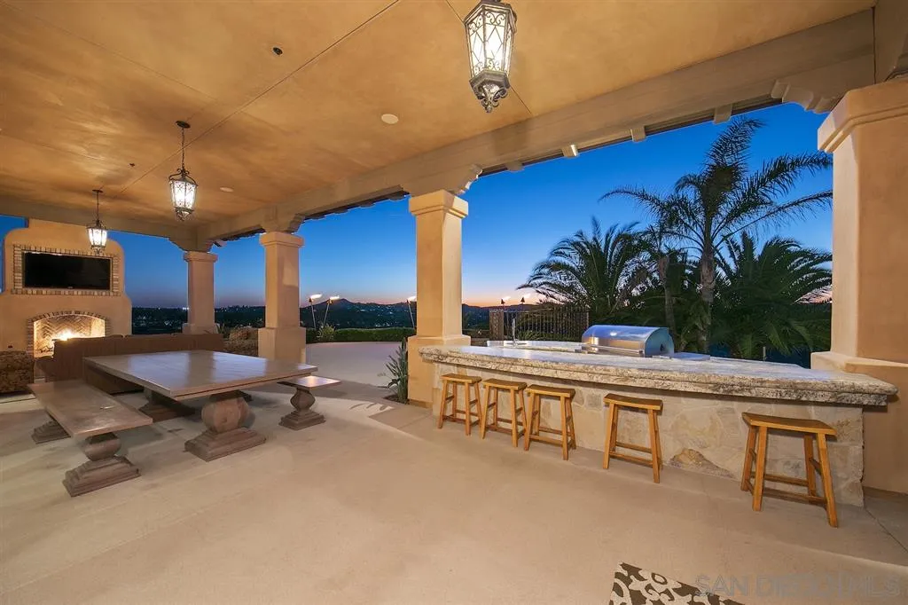 17087 Old Coach Road Poway, CA 92064 - Photo 25 of 25 a living room with furniture a table and potted plants