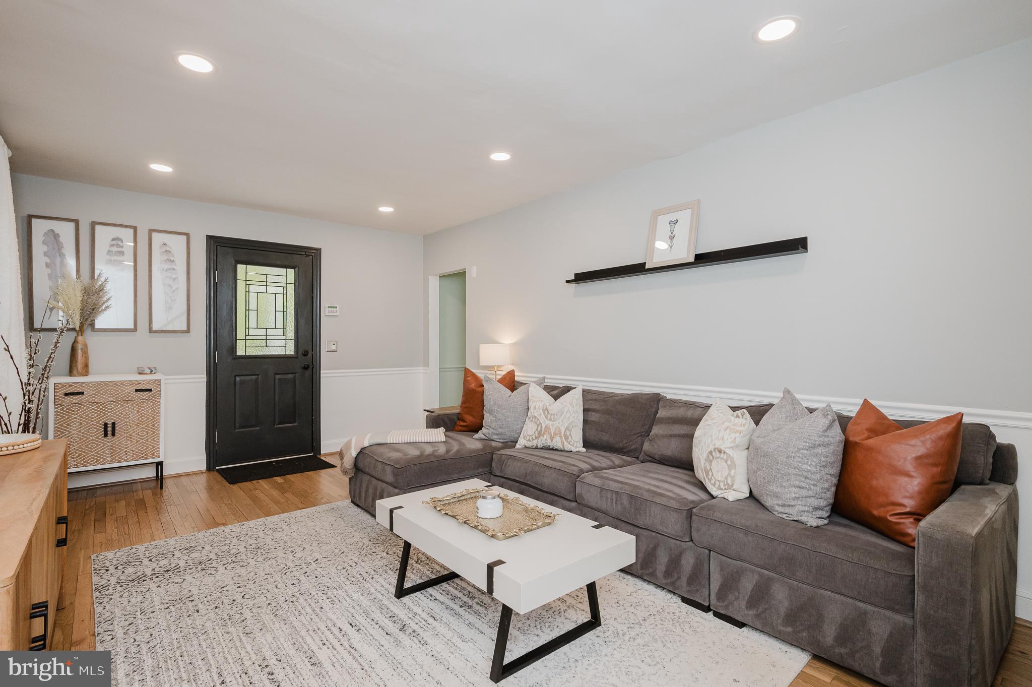616 Sudbrook Road Baltimore, MD 21208 - Photo 11 of 58 a living room with furniture and wooden floor