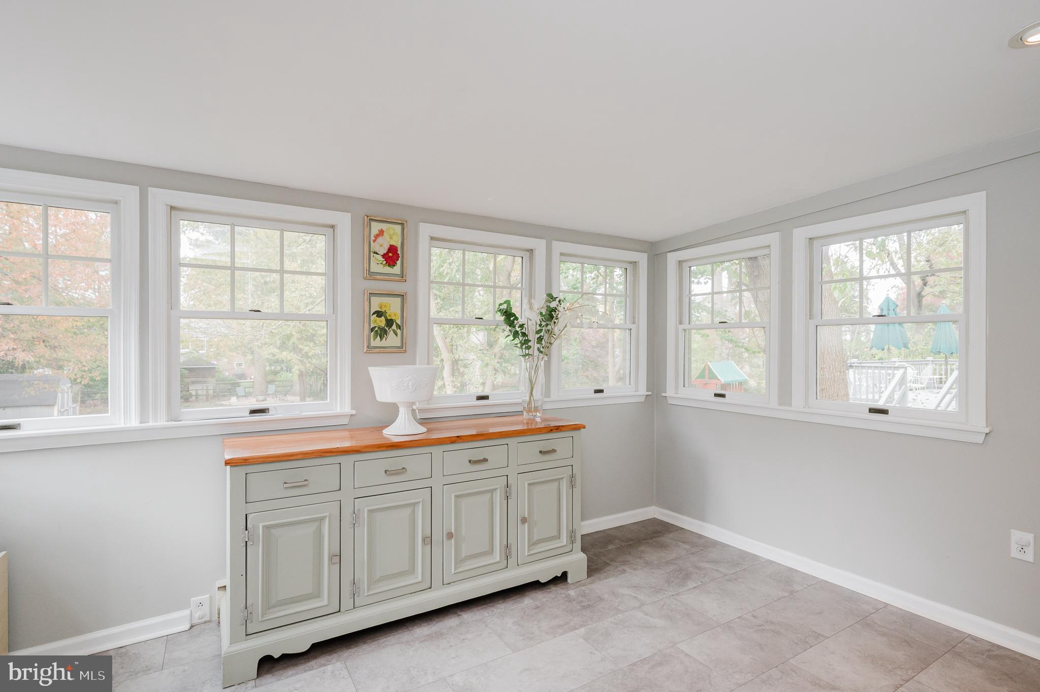 616 Sudbrook Road Baltimore, MD 21208 - Photo 21 of 58 a spacious bathroom with double vanity and a large window