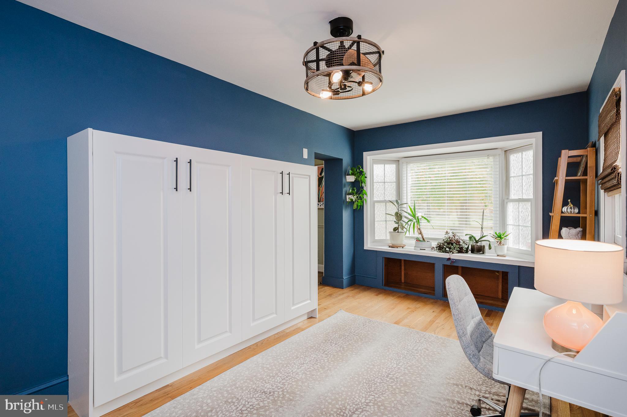 616 Sudbrook Road Baltimore, MD 21208 - Photo 28 of 58 a view of a workspace with furniture and a window