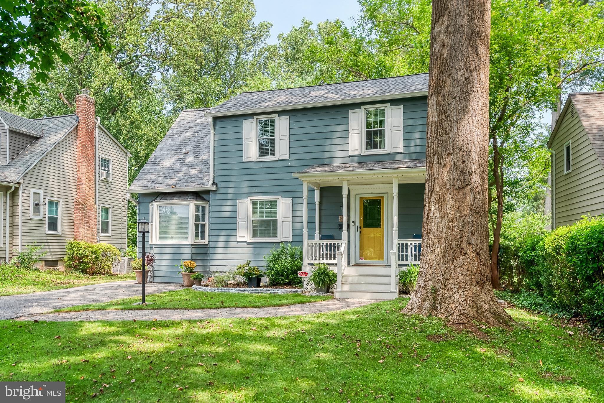 616 Sudbrook Road Baltimore, MD 21208 - Photo 3 of 58 a front view of a house with a garden