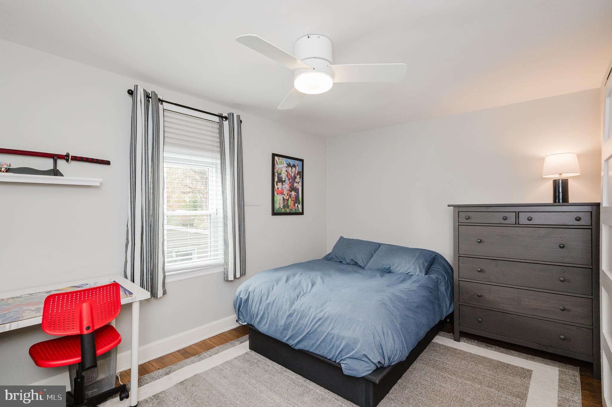 616 Sudbrook Road Baltimore, MD 21208 - Photo 38 of 58 a bedroom with a bed and window