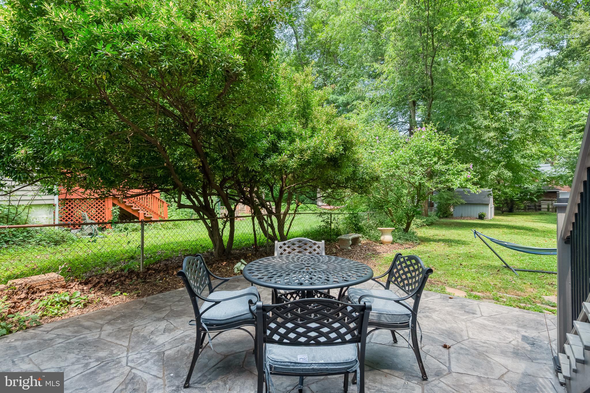 616 Sudbrook Road Baltimore, MD 21208 - Photo 45 of 58 a view of a chairs and table in the garden