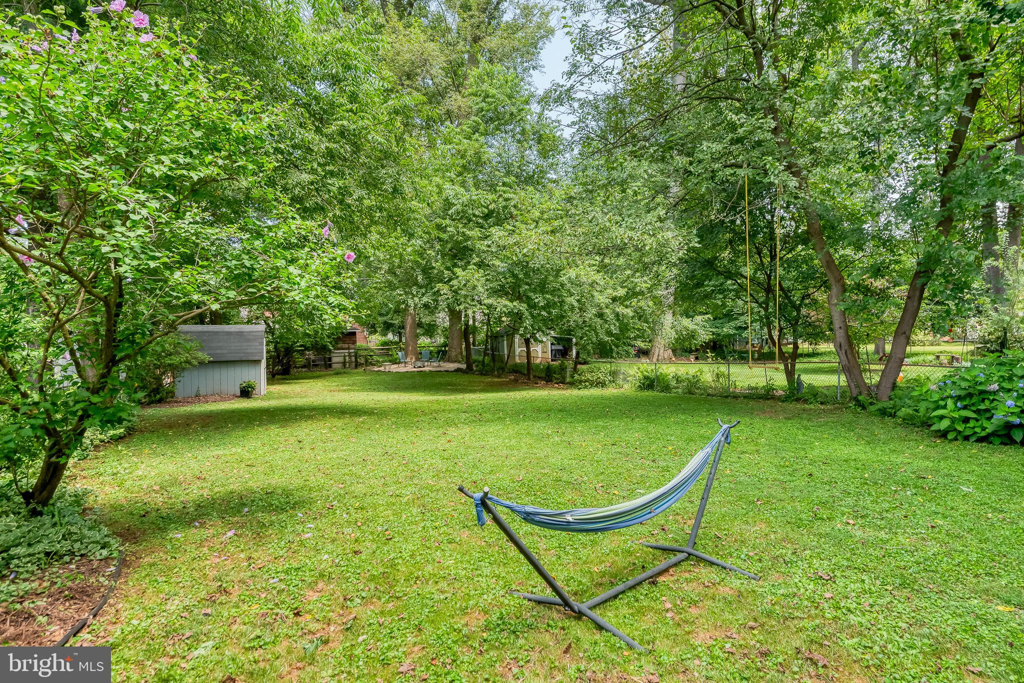 616 Sudbrook Road Baltimore, MD 21208 - Photo 55 of 58 a view of a table and chairs in the garden
