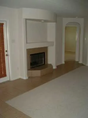 a living room with a fireplace