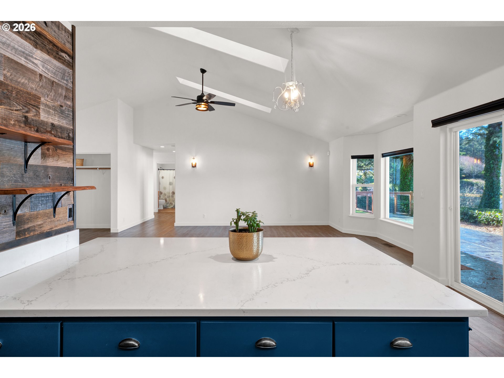 85675 Glenada Road Florence, OR 97439 - Photo 13 of 42 a view of a kitchen with a sink a window and chairs