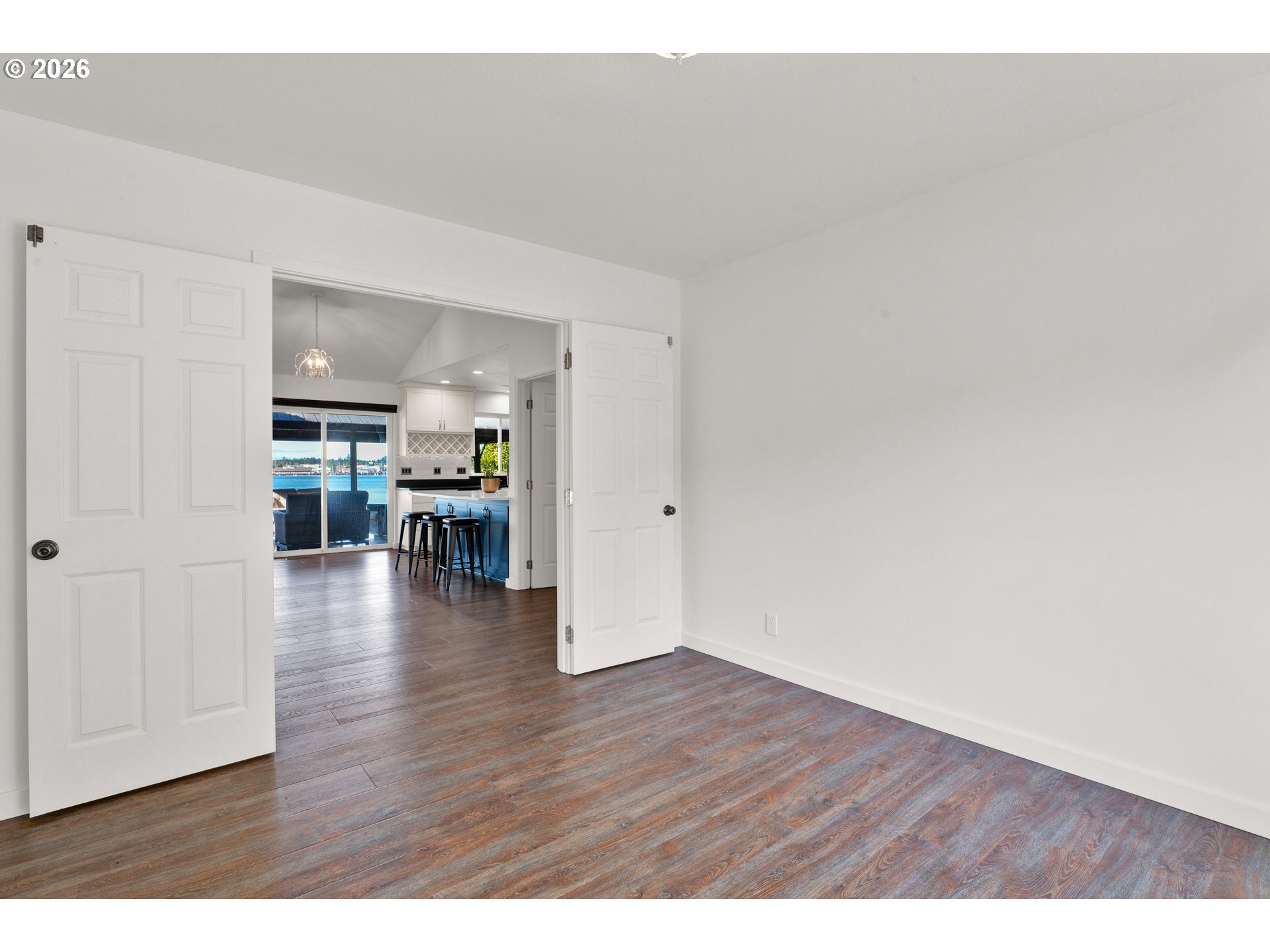 85675 Glenada Road Florence, OR 97439 - Photo 16 of 42 a view of an empty room and wooden floor